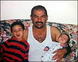 Mohammad Mahjoub and two of his children